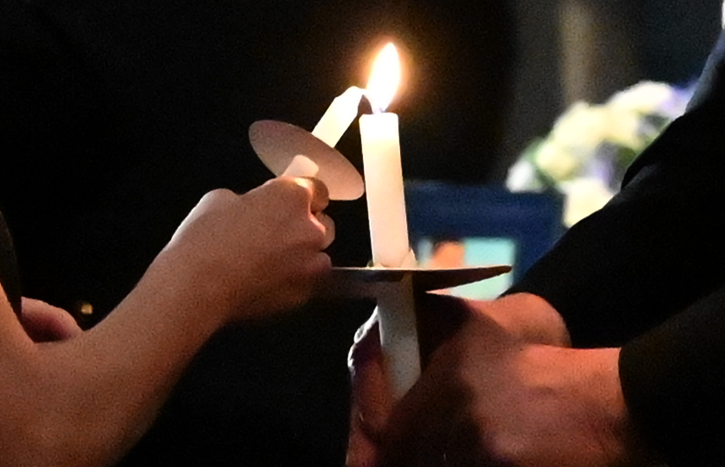 Candles are lit for those remembering friends and loved ones lost to drug overdose at the 9th Annual Drug Overdose and Prevention Vigil Tuesday at Portico at St. John in Westminster. (Jeffrey F. Bill/Staff photo)