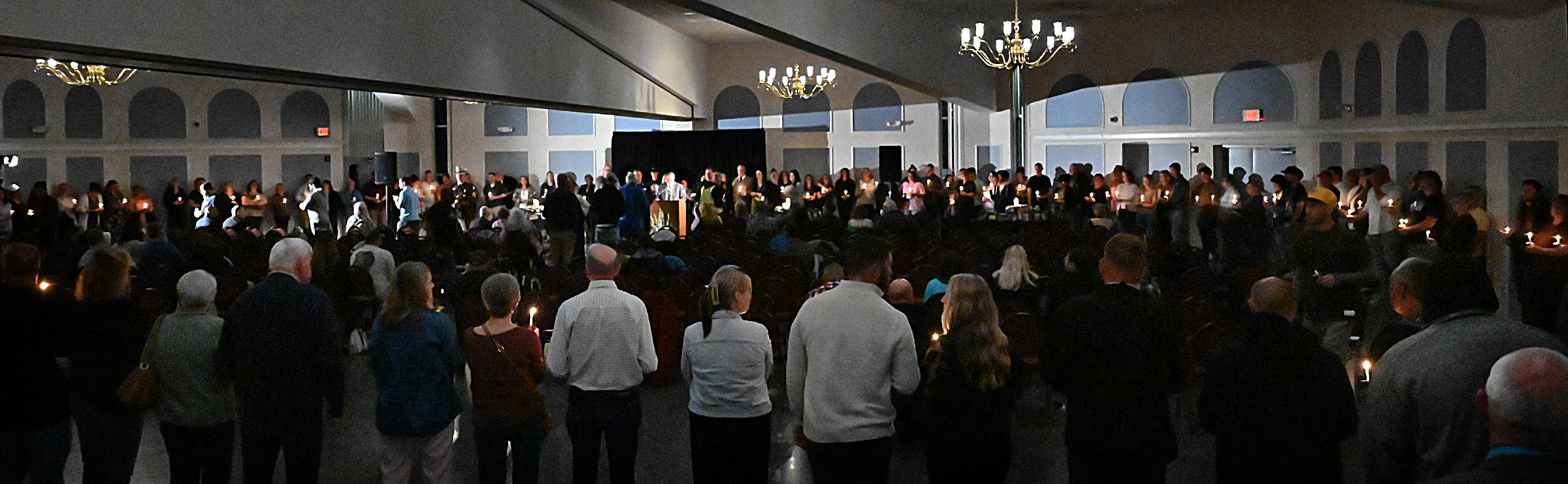 Candles are lit for those remembering friends and loved ones lost to drug overdose at the 9th Annual Drug Overdose and Prevention Vigil Tuesday at Portico at St. John in Westminster. (Jeffrey F. Bill/Staff photo)