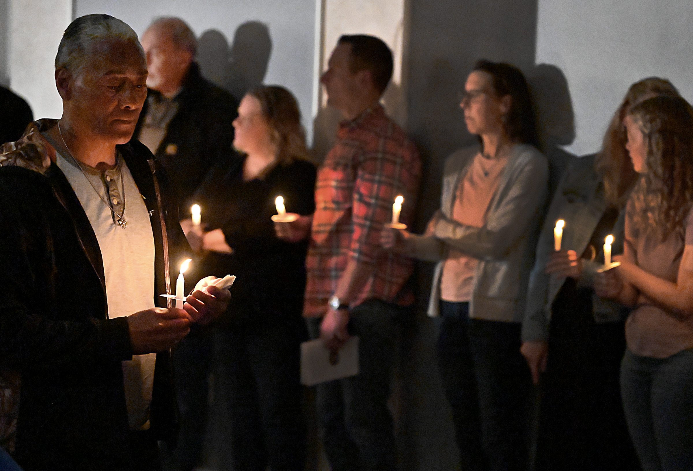 Candles are lit for those remembering friends and loved ones lost to drug overdose at the 9th Annual Drug Overdose and Prevention Vigil Tuesday at Portico at St. John in Westminster. (Jeffrey F. Bill/Staff photo)