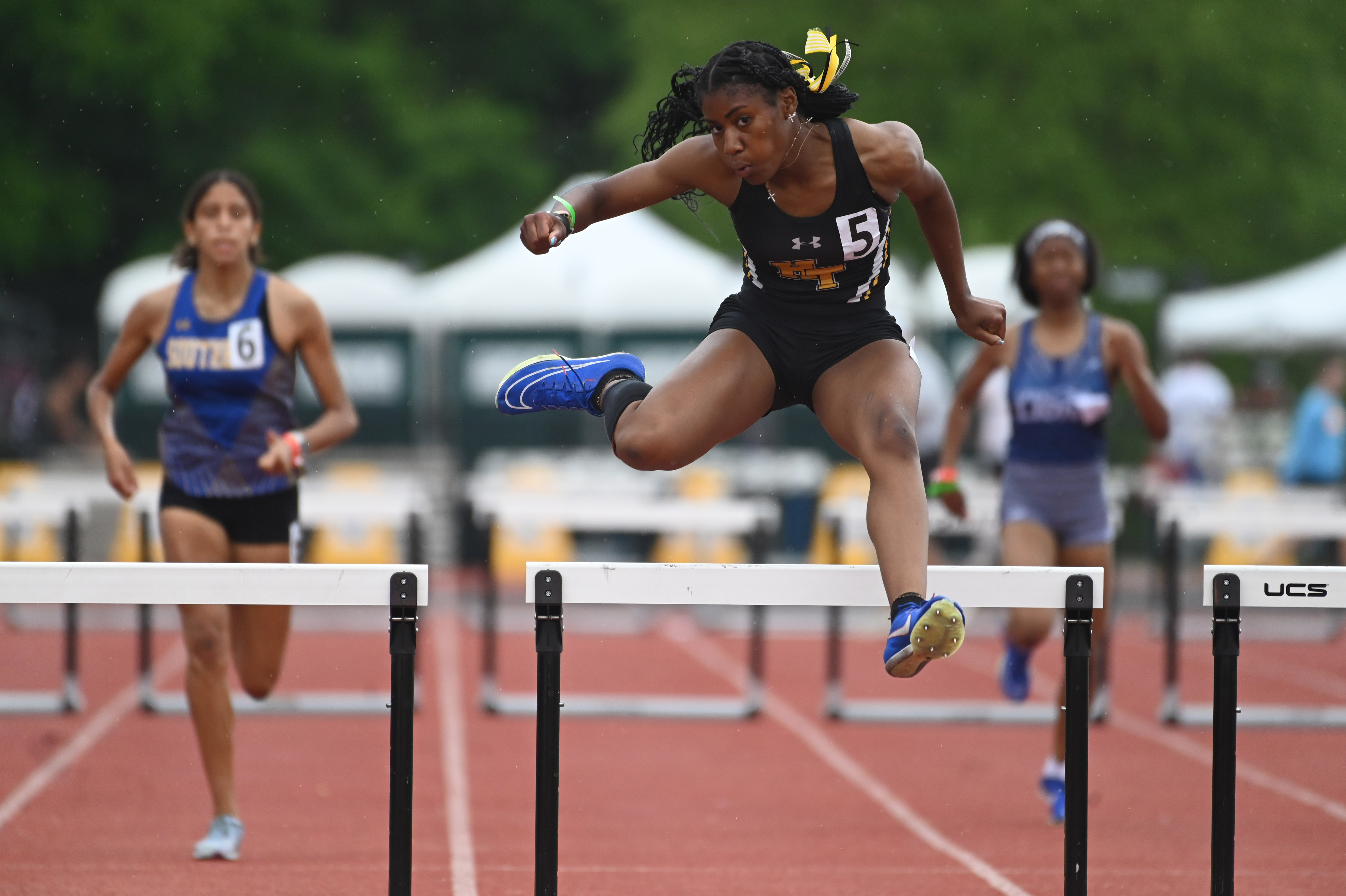 Harford Tech's Destiny Baker clears a hurdle on her way to winning the 2A girls 300 meter hurdles during the MPSSAA Track and Field State Championships at Prince George's Sports and Learning Complex on Thursday. (Brian Krista/staff photo)