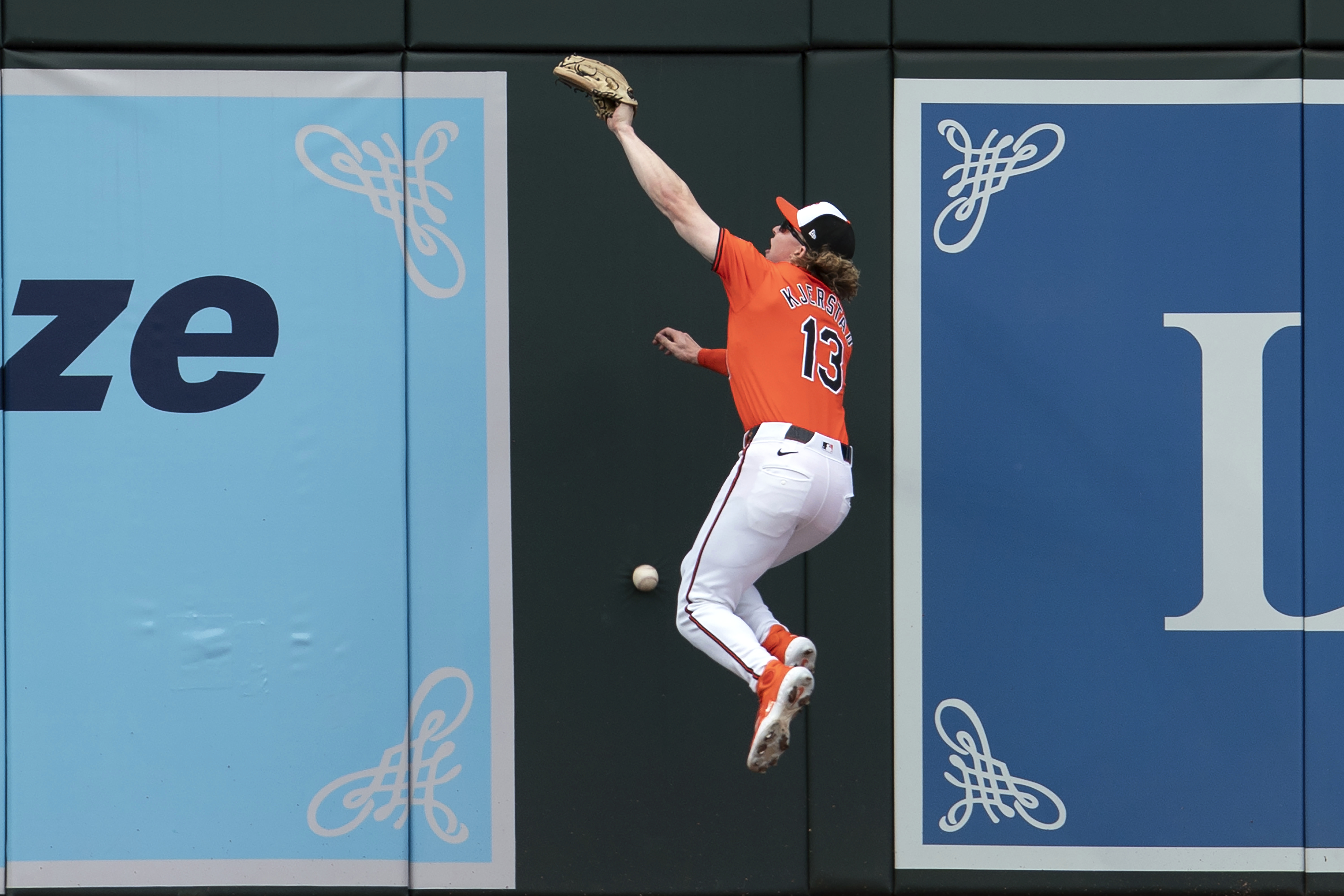 Baltimore Orioles outfielder Heston Kjerstad misses a catch during a baseball game against the Arizona Diamondbacks, Saturday, May 11, 2024, in Baltimore. (AP Photo/Jose Luis Magana)