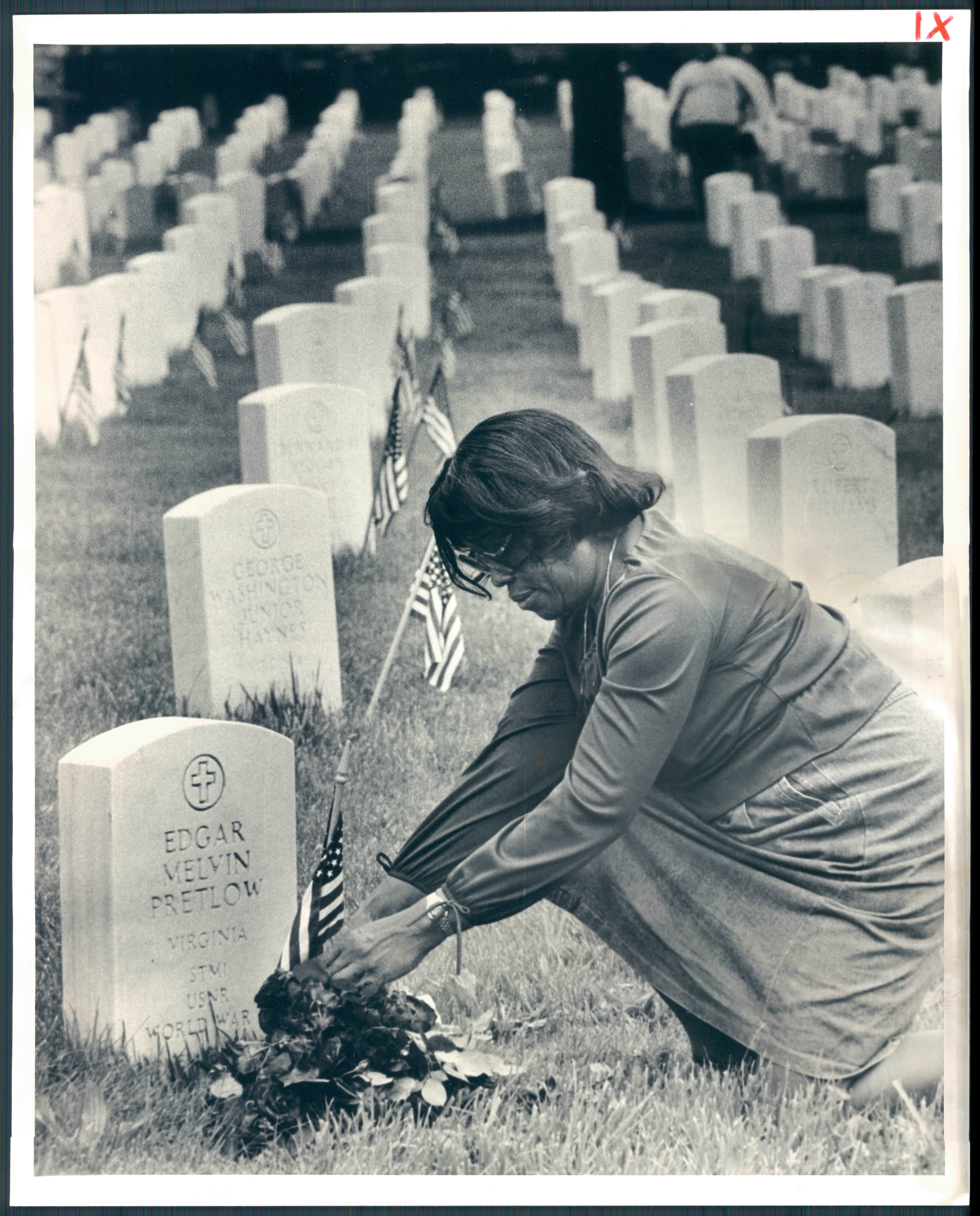 May 31, 1983 - MEMORIAL DAY -- Ethel Heartwell Pretlow arranges flowers on her husband's grave in Baltimore National Cemetery on Frederick Road. Edgar Melvin Pretlow served in the Navy during World War II and died in 1964. Photo by Walter M. McCardell ACP-797-BSDate Created: 1983-05-31 Copyright Notice: Baltimore Sun Folder Description: Memorial Day Celebrations (3) Folder Extended Description: 318-4 | Title: MEMORIAL DAY (3) 319-4 Subject: MEMORIAL DAY