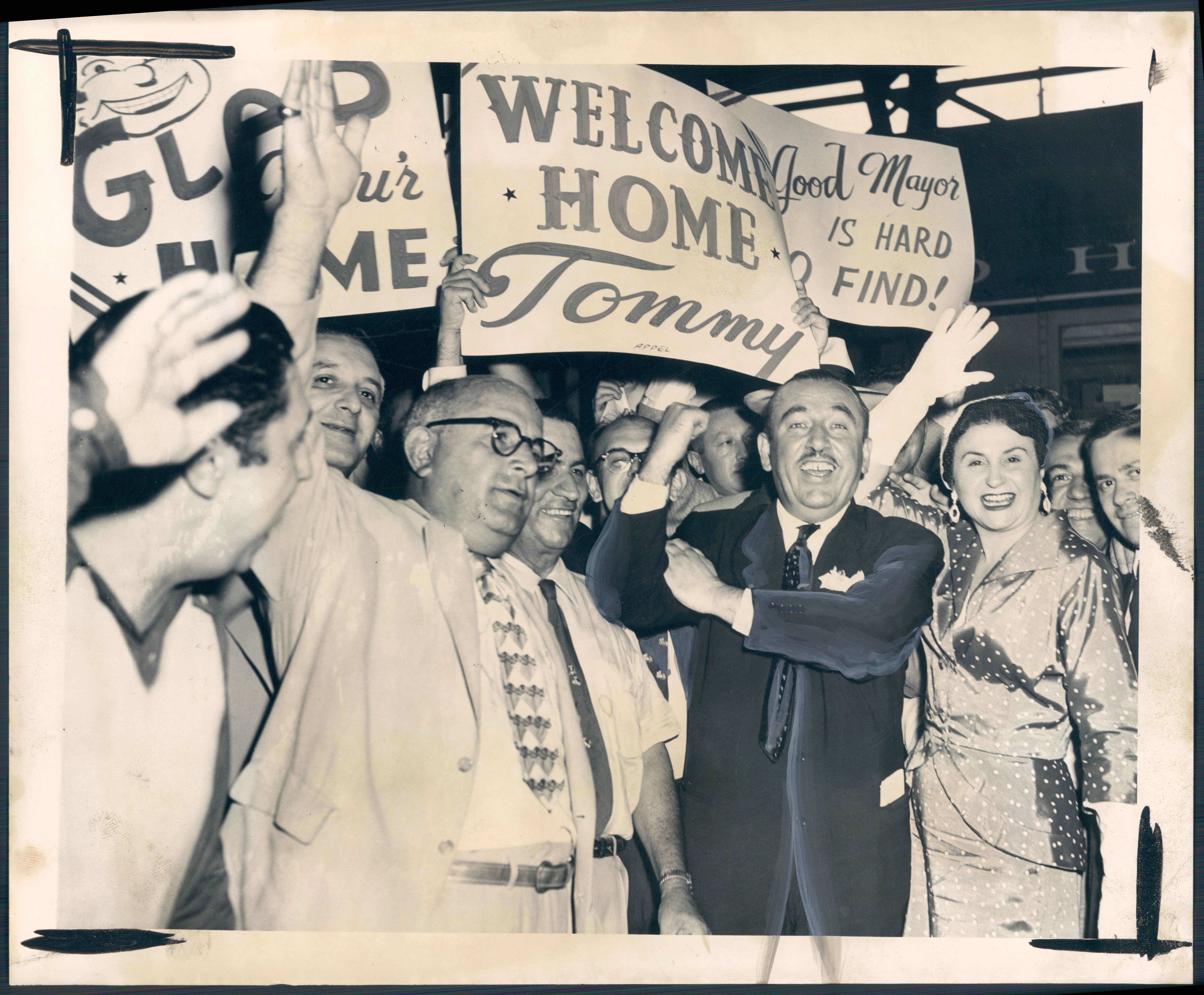 August 5, 1953 - Mayor Thomas D'Alesandro arrives home to a warm welcome. Photo by Walter M. McCardell ADY-522-BSDate Created: 1953-08-05 Copyright Notice: Baltimore Sun Folder Description: D'ALESANDRO, THOMAS (MAYOR) Folder Extended Description: D'ALESANDRO, THOMAS (MAYOR) EUROPE TRIPS Title: D'ALESANDRO, THOMAS (MAYOR) EUROPE TRIPS Subject: D'ALESANDRO, THOMAS (MAYOR)