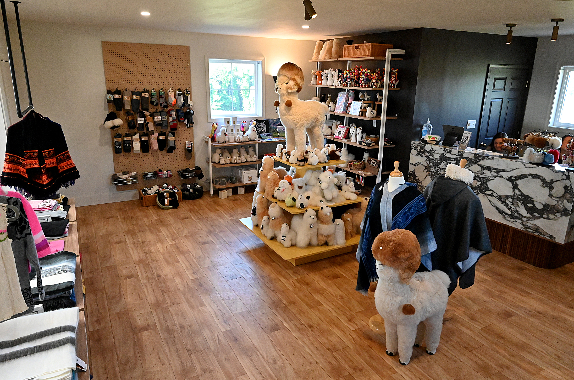 The Black Barn Alpacas gift shop offers several items for sale, some made in Peru and Ecuador, from alpaca yarn to items made with alpaca fleece such as socks, ponchos, throws, slippers, toys, etc. Black Barn Alpacas in Finksburg is owned and operated by Travis and Yussy McManus. (Jeffrey F. Bill/Staff photo)