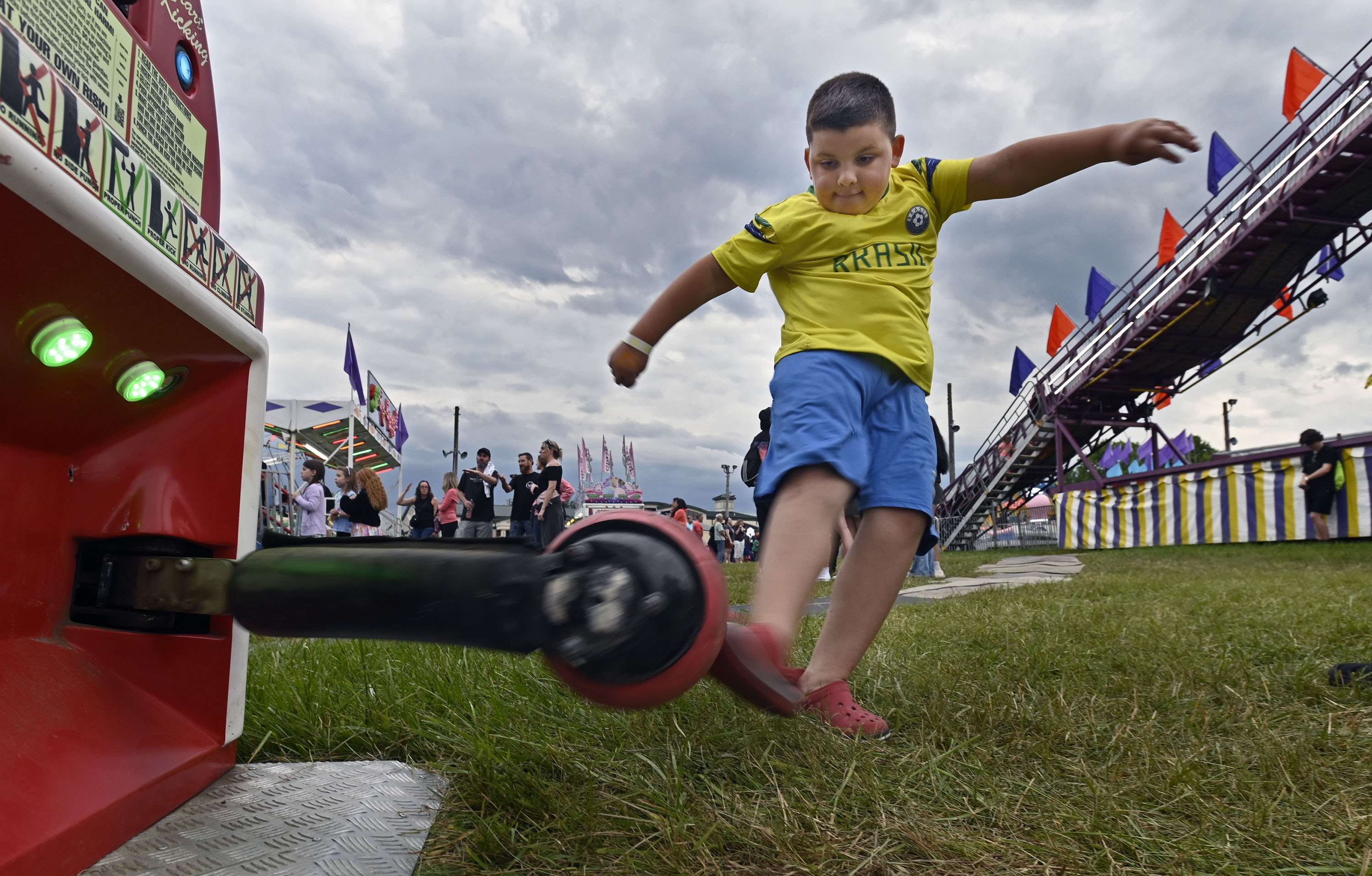 Harlen Chavez, 7, plays a kick ball game at Sykesville Freedom District Fire Department's Annual firemen's carnival which runs from June 8-15. (Kenneth K. Lam/Staff)