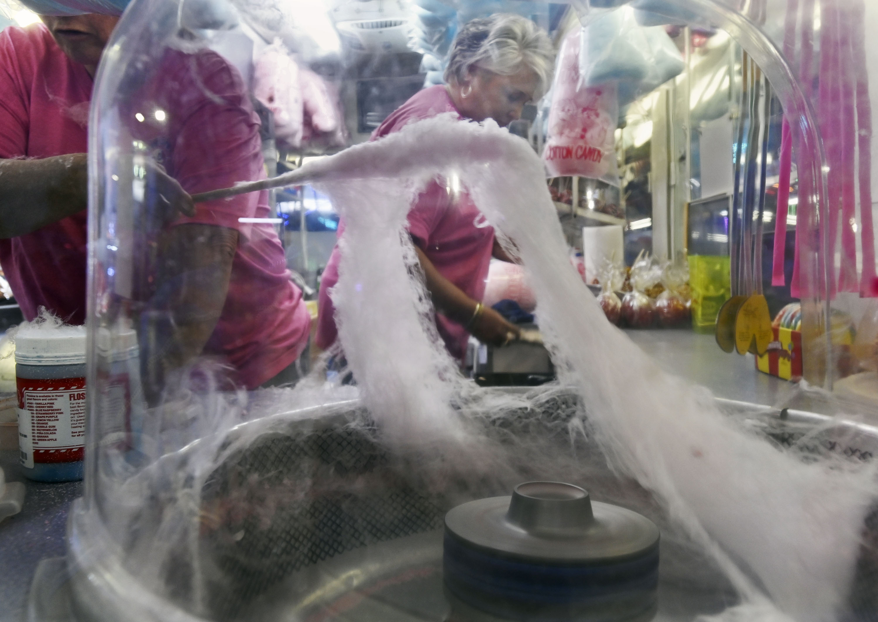 Food vendor spins cotton candy at Sykesville Freedom District Fire Department's Annual firemen's carnival which runs from June 8-15. (Kenneth K. Lam/Staff)