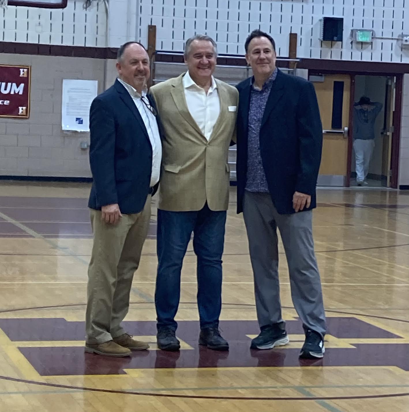 From left, basketball coach Jim Rhoads, Mike Kalisz and Jean-Paul (Rowdy) Bibaud pose during a special night dedicated to retiring Hereford athletic director Kalisz. Bibaud will take over the role from Kalisz. (Courtesy photo)