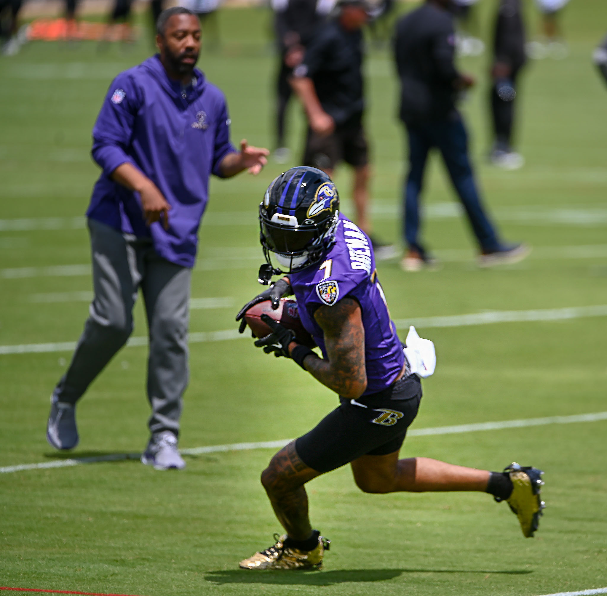 Baltimore Ravens wide receiver Rashod Bateman catches a pass during mandatory minicamp practice in Owings Mills, Md. (Kevin Richardson/Staff)