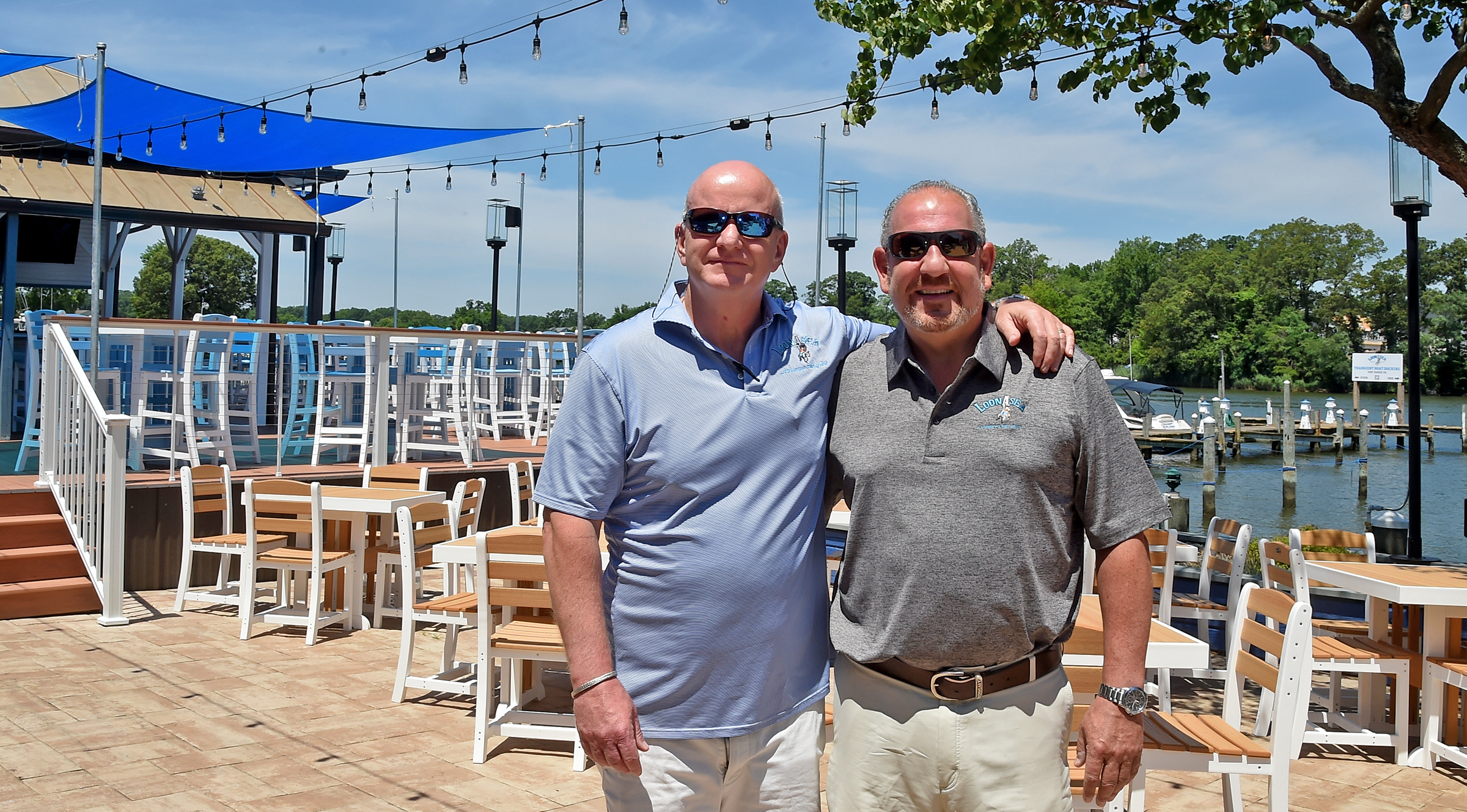Owners Bill Larney, left, and Steven Litrenta, right, have been partners in 6 restaurants for 32 years. Their new restaurant/bar, LoonASea, is on the waterfront of Hopkins Creek in Essex. (Barbara Haddock Taylor/Staff)
