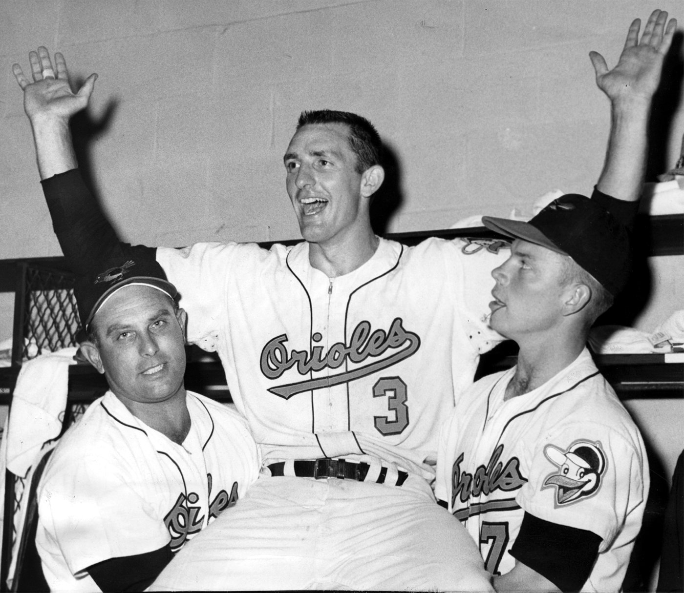 Orioles shortstop Ron Hansen, center, with outfielders Gene Woodling, left, and Jackie Brandt, right, after hitting a three-run double to defeat Boston, 7-5, in the first game of a doubleheader May 30, 1960.