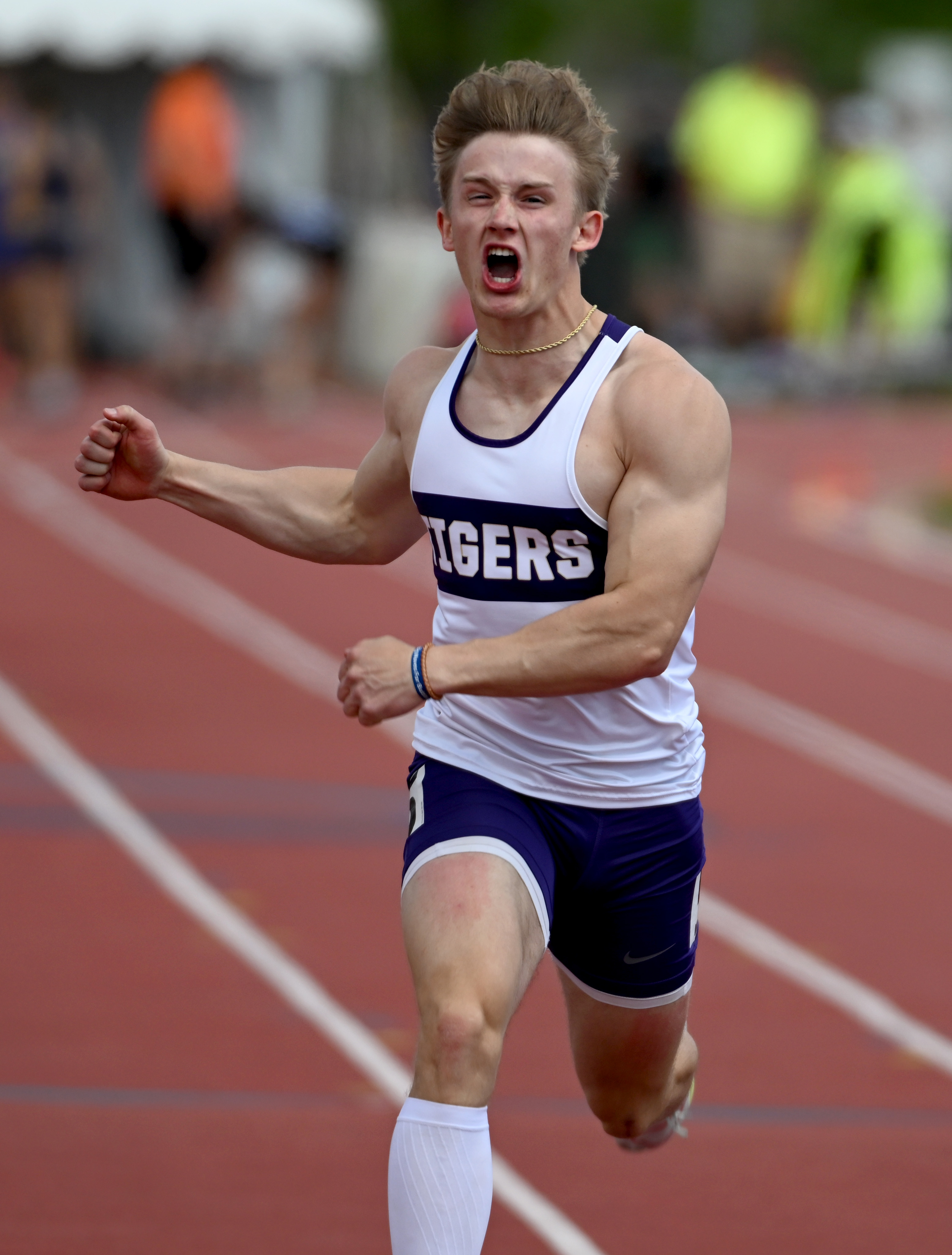 Griffin Eastman, of Holy Family, wins the 100 meters during the last day of the Colorado State Track and Field Championships on May 17, 2024.(Cliff Grassmick/Staff Photographer)