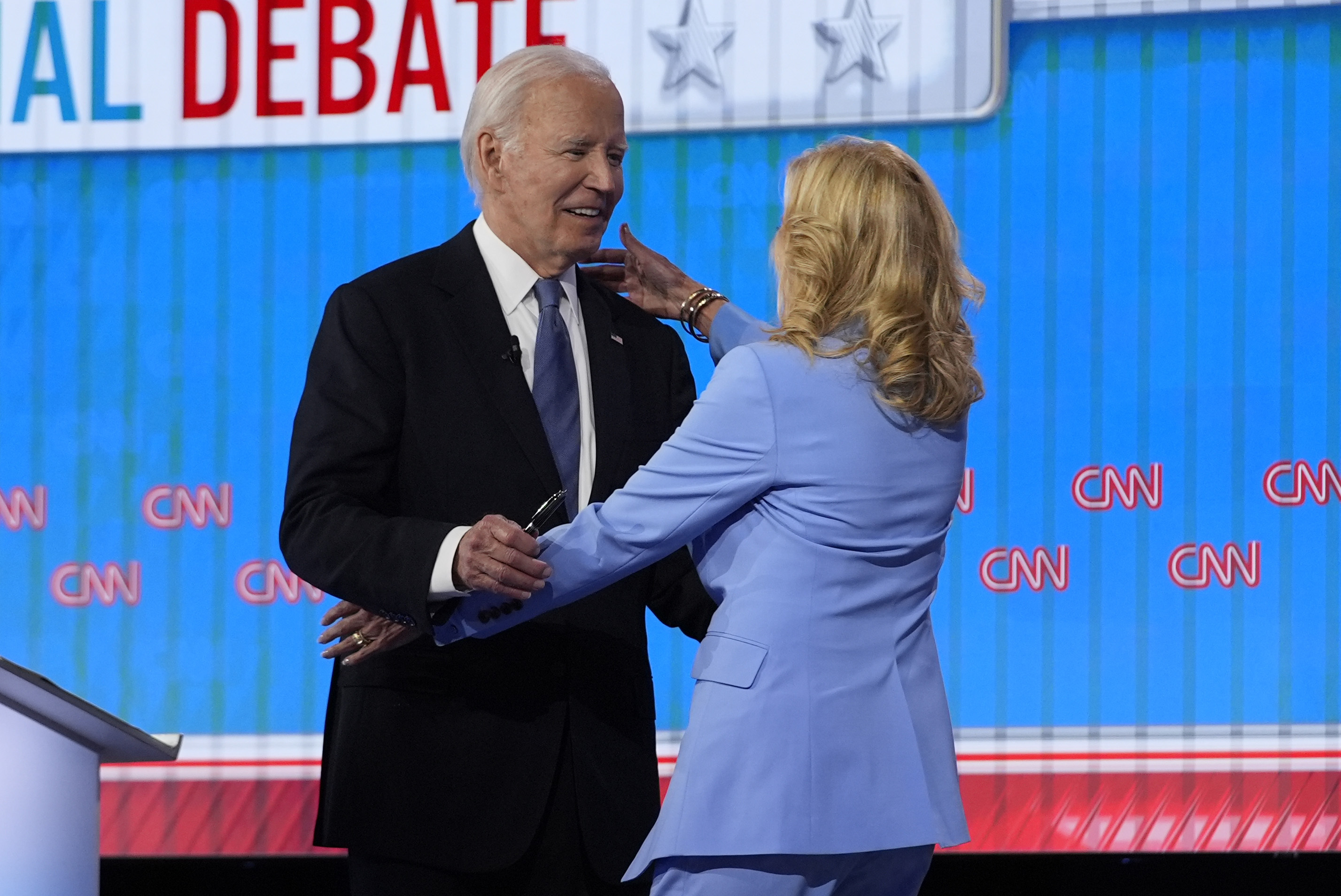 First lady Jill Biden, right, hugs President Joe Biden at the conclusion of a presidential debate with Republican presidential candidate former President Donald Trump hosted by CNN, Thursday, June 27, 2024, in Atlanta. (AP Photo/Gerald Herbert)