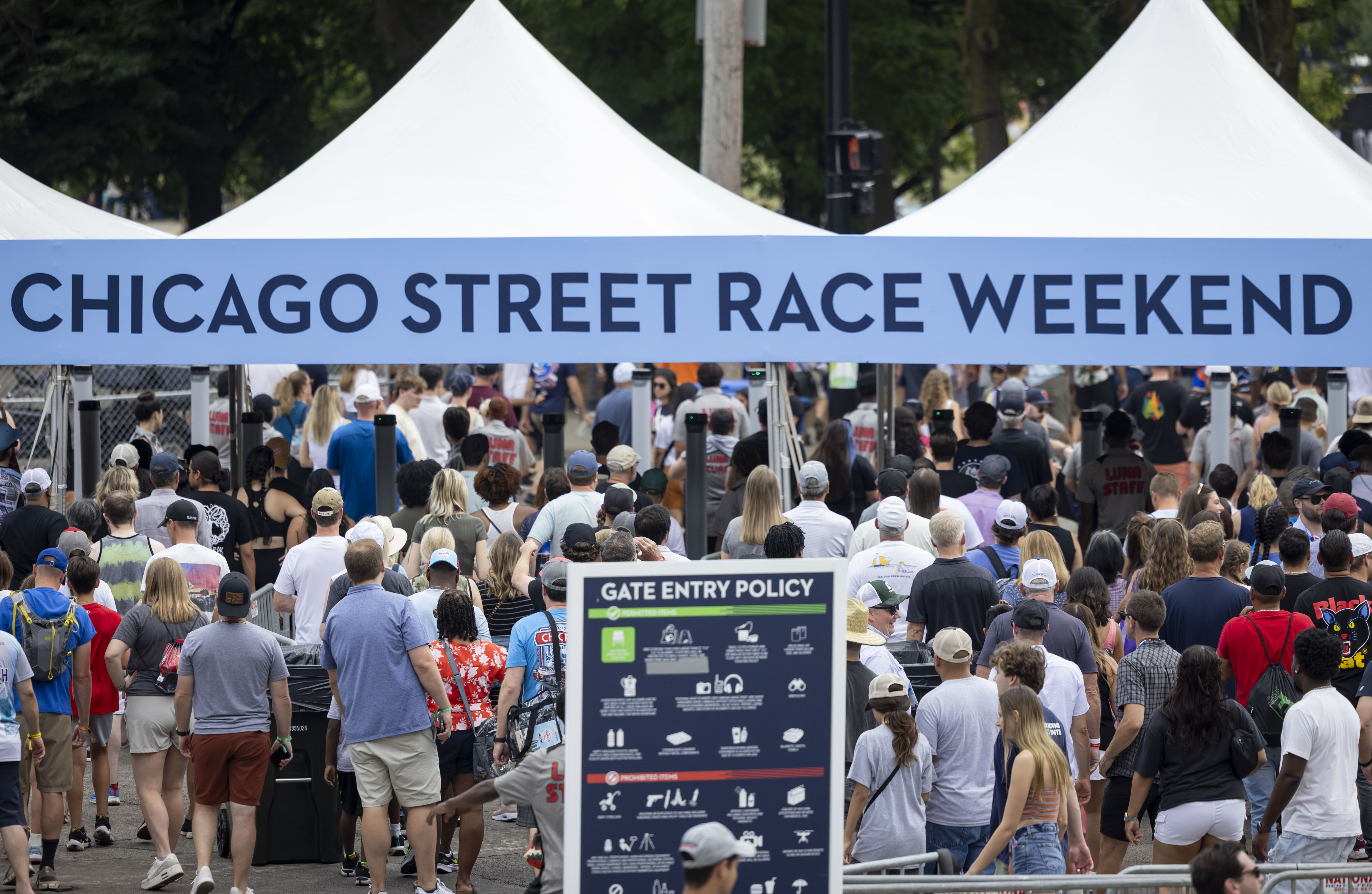 People line up to enter the gates before the NASCAR Chicago Street Race on Sunday, July 7, 2024. (Brian Cassella/Chicago Tribune)