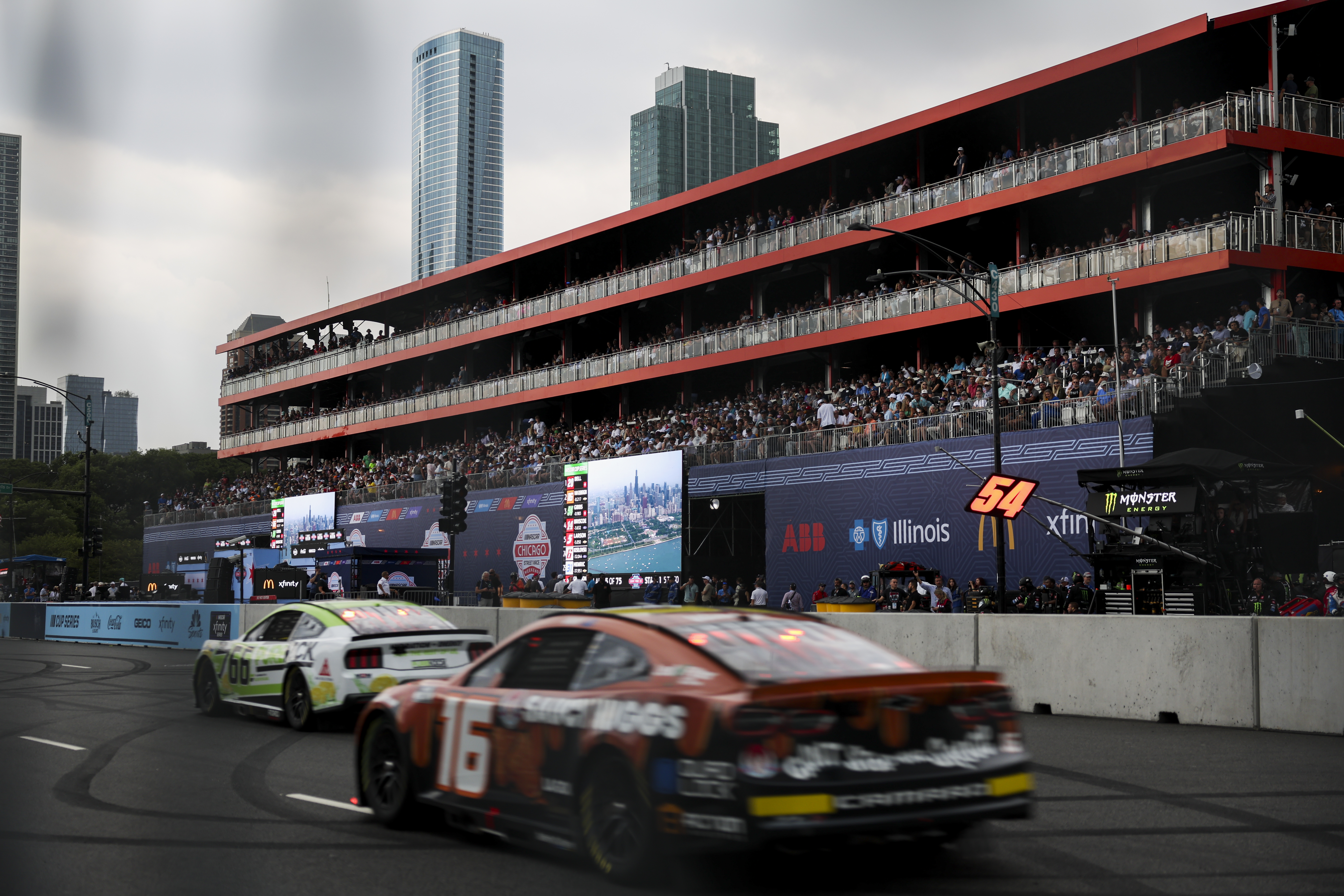 Drivers race pass The Skyline box during the NASCAR Chicago Street Race in Grant Park on July 7, 2024. (Eileen T. Meslar/Chicago Tribune)