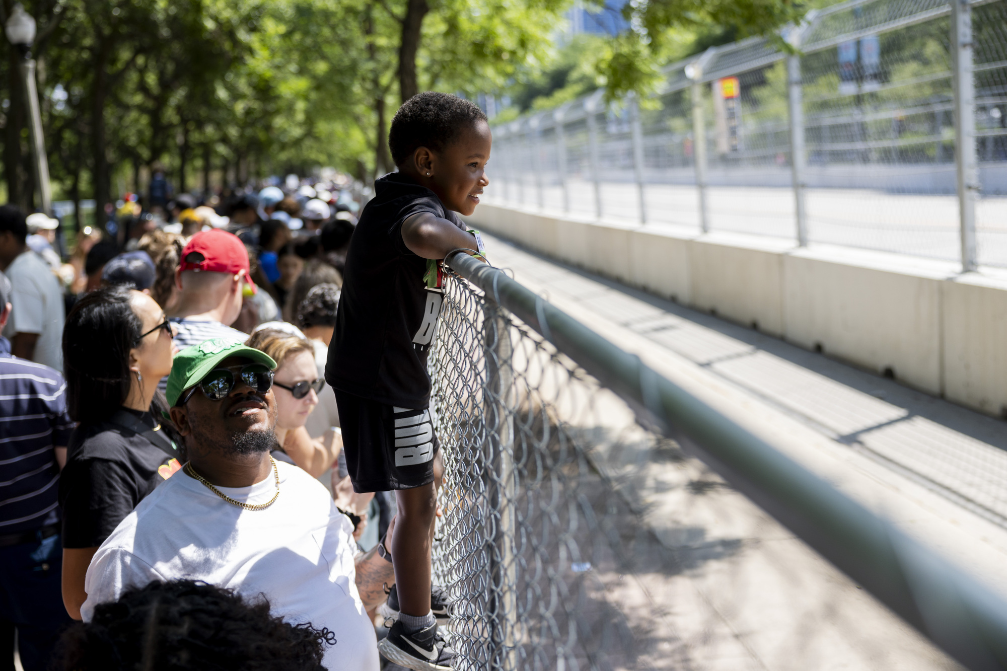 Onyx Carter watches the Xfinity Series during the first day of the NASCAR Street Race on Saturday, July 6, 2024, at Grant Park in Chicago (Vincent Alban/Chicago Tribune)