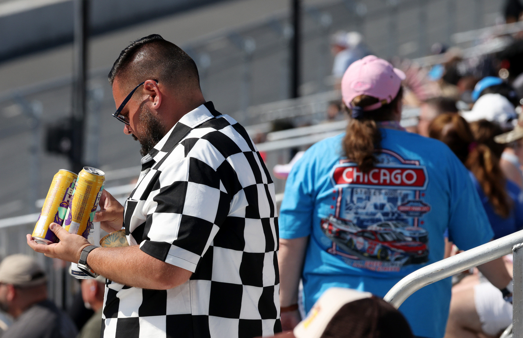 A fan wears a checkered shirt during the NASCAR Xfinity Series race Saturday, July 6, 2024, in Chicago. (John J. Kim/Chicago Tribune)