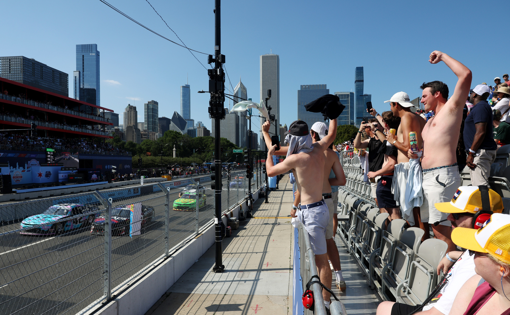 Fans cheer as the NASCAR Xfinity Series race resumes after a caution flag Saturday, July 6, 2024, in Chicago. (John J. Kim/Chicago Tribune)