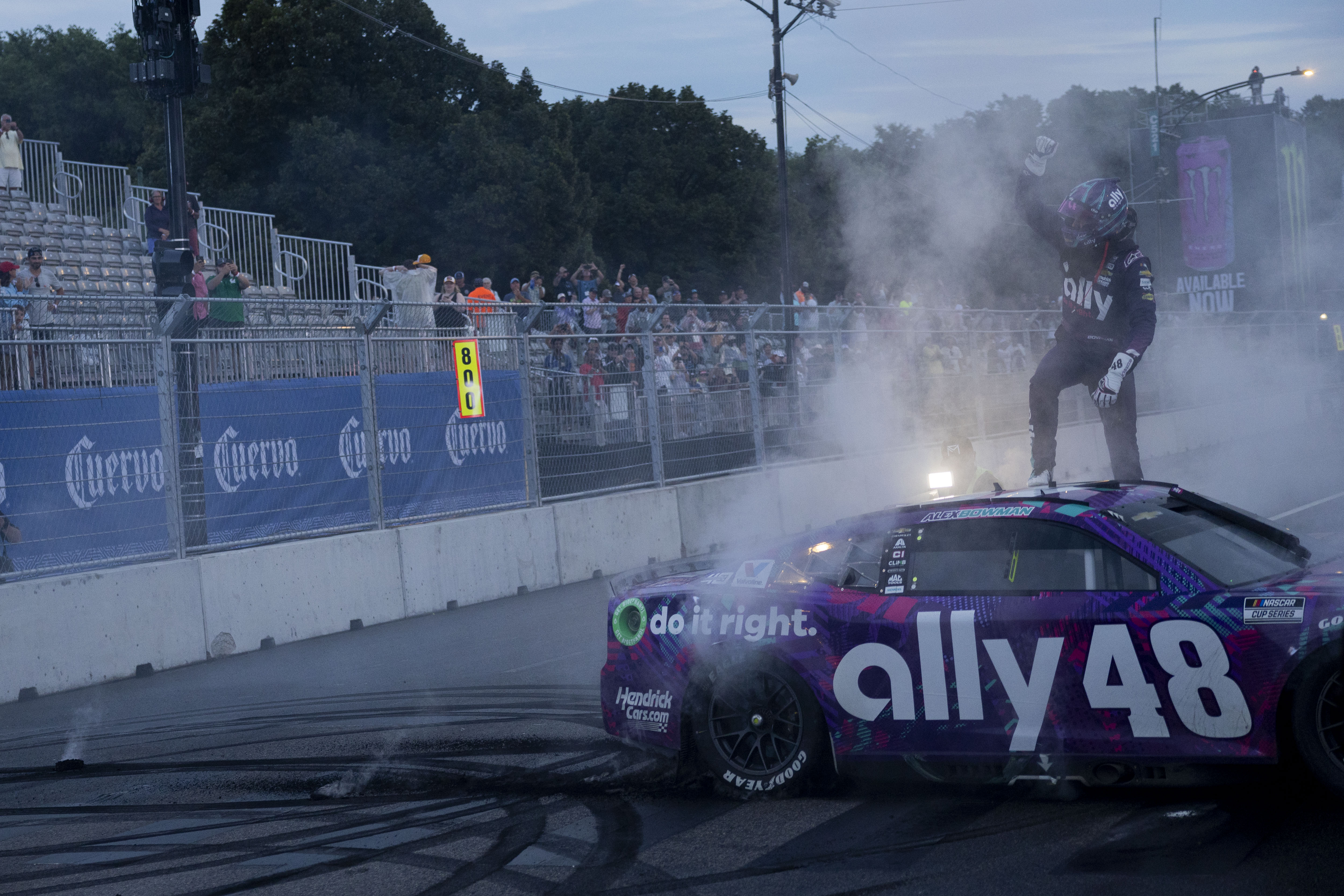 Alex Bowman #48 stands on his car after winning the Grant Park 165 of the NASCAR Street Race on Sunday, July 7, 2024, at Grant Park in Chicago. (Vincent Alban/Chicago Tribune)