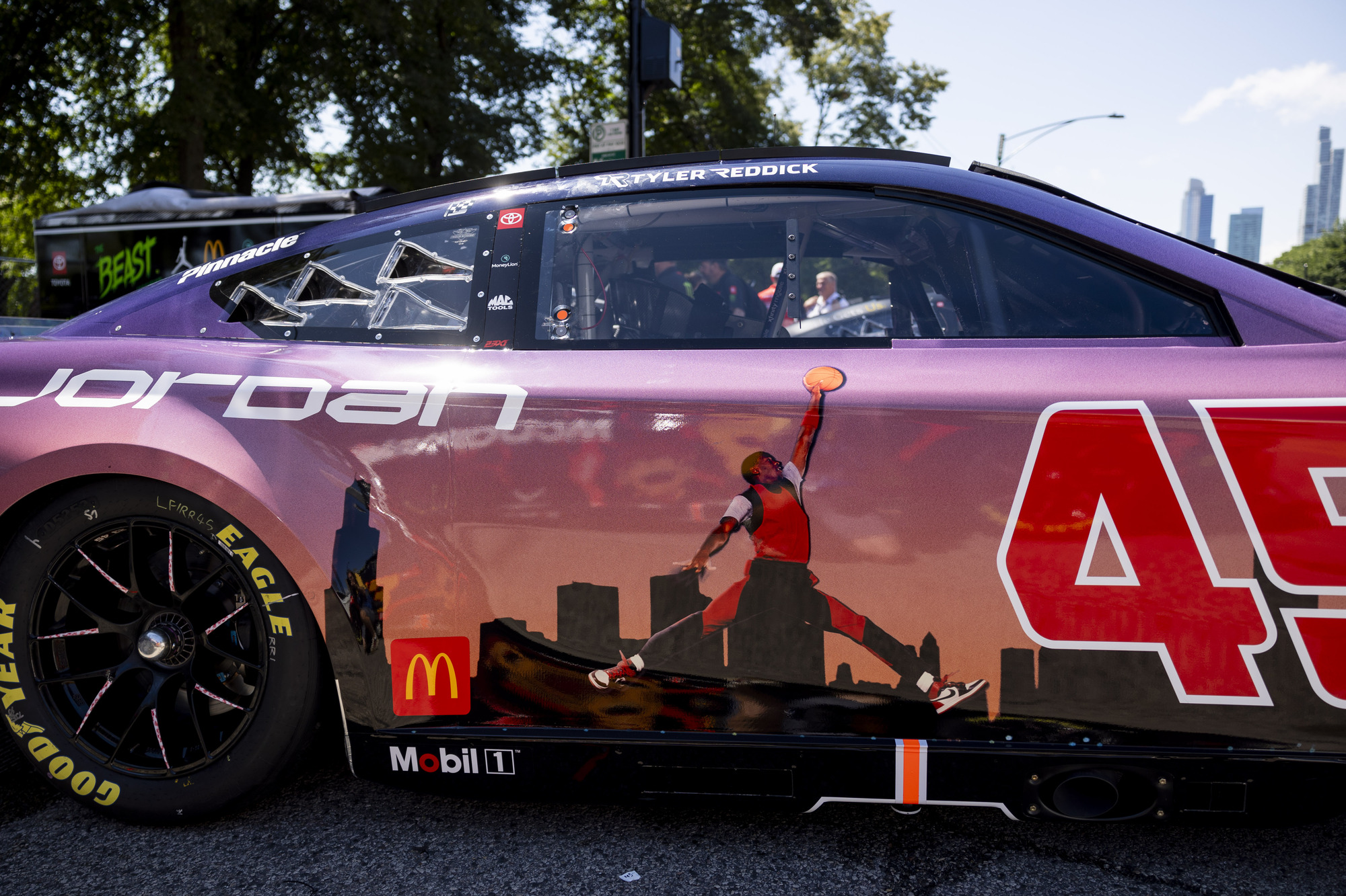 A car with a graphic of Michael Jordan in the paddock during the first day of the NASCAR Street Race on Saturday, July 6, 2024, at Grant Park in Chicago (Vincent Alban/Chicago Tribune)