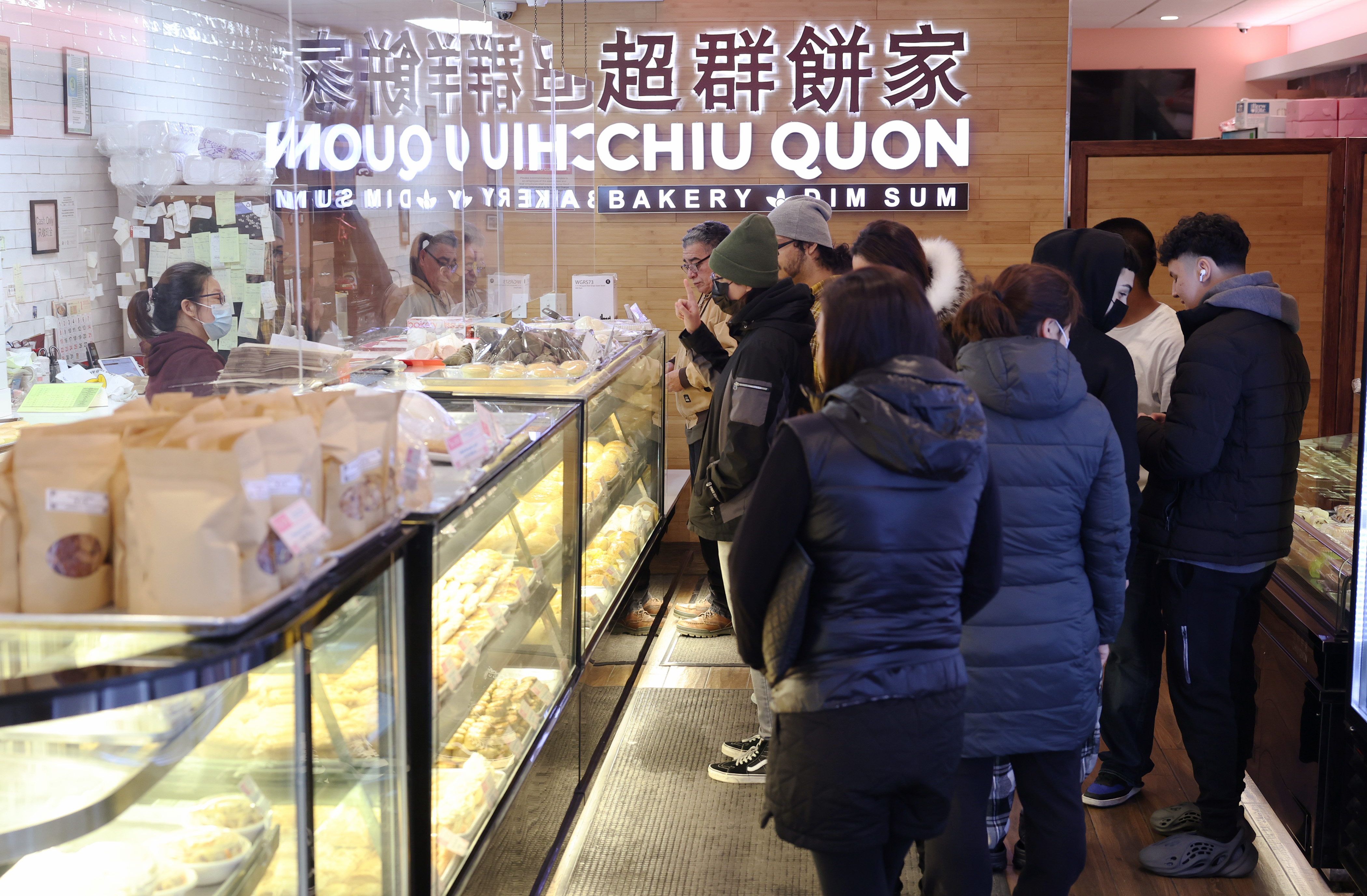 Customers wait to order at Chiu Quon Bakery and Dim Sum on Jan. 12, 2023. (John J. Kim/Chicago Tribune)