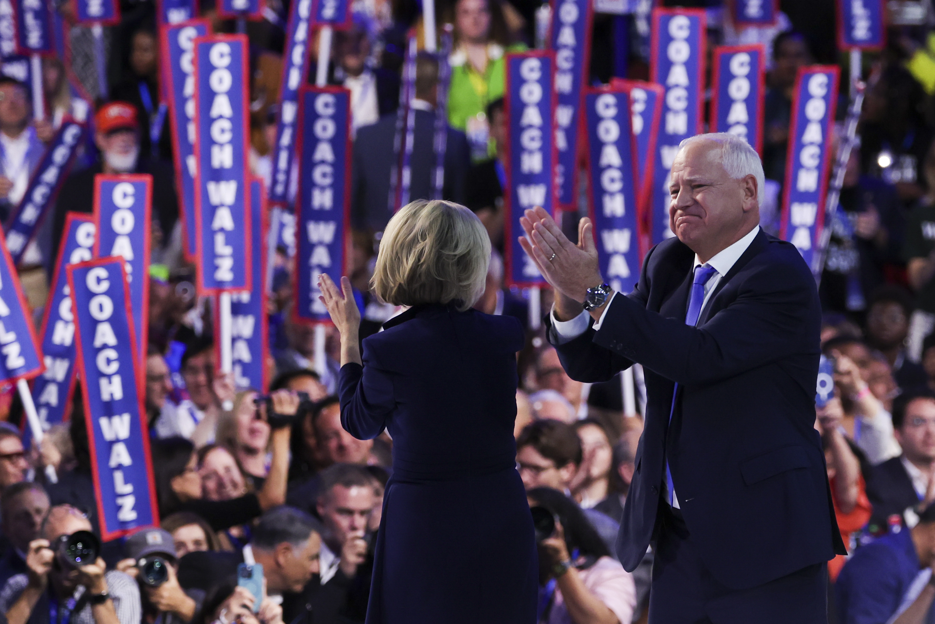 Democratic vice presidential nominee Minnesota Gov. Tim Walz is joined on stage by his wife Gwen Walz, children Gus and Hope after his speech at the Democratic National Convention at the United Center in Chicago on Aug. 21, 2024. (Eileen T. Meslar/Chicago Tribune)