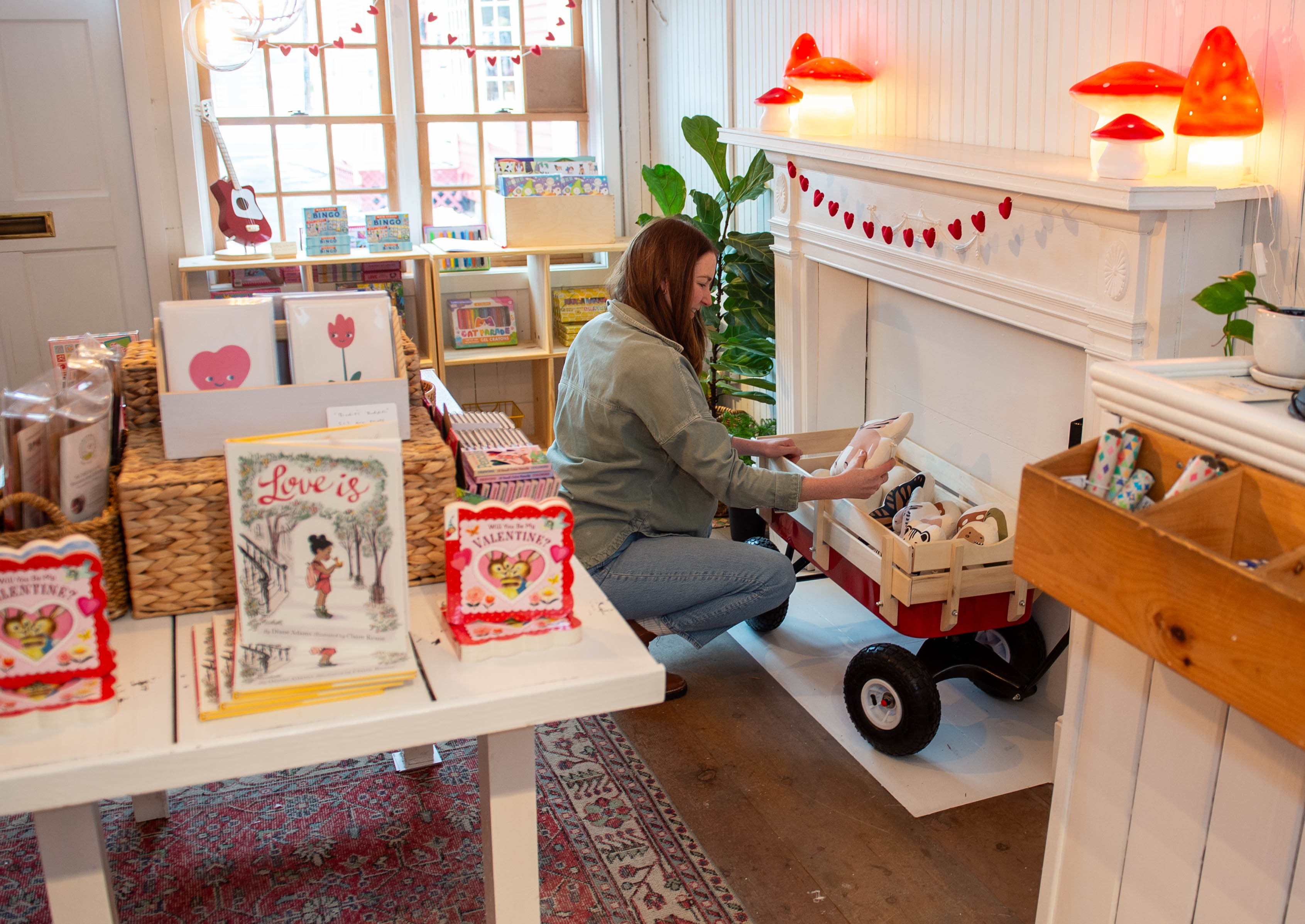 Jen La Bella, owner of Birdie's, shows some of the toys at her store in Wethersfield on Friday, Jan. 19, 2024. The three stores; Birdie's, Raised On Ridge and Cottonwood + Church recently opened at 135 Main St. in Wethersfield. (Aaron Flaum/Hartford Courant)