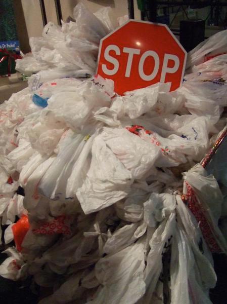 A message from the Green Festival to stop using disposable plastic shopping bags.