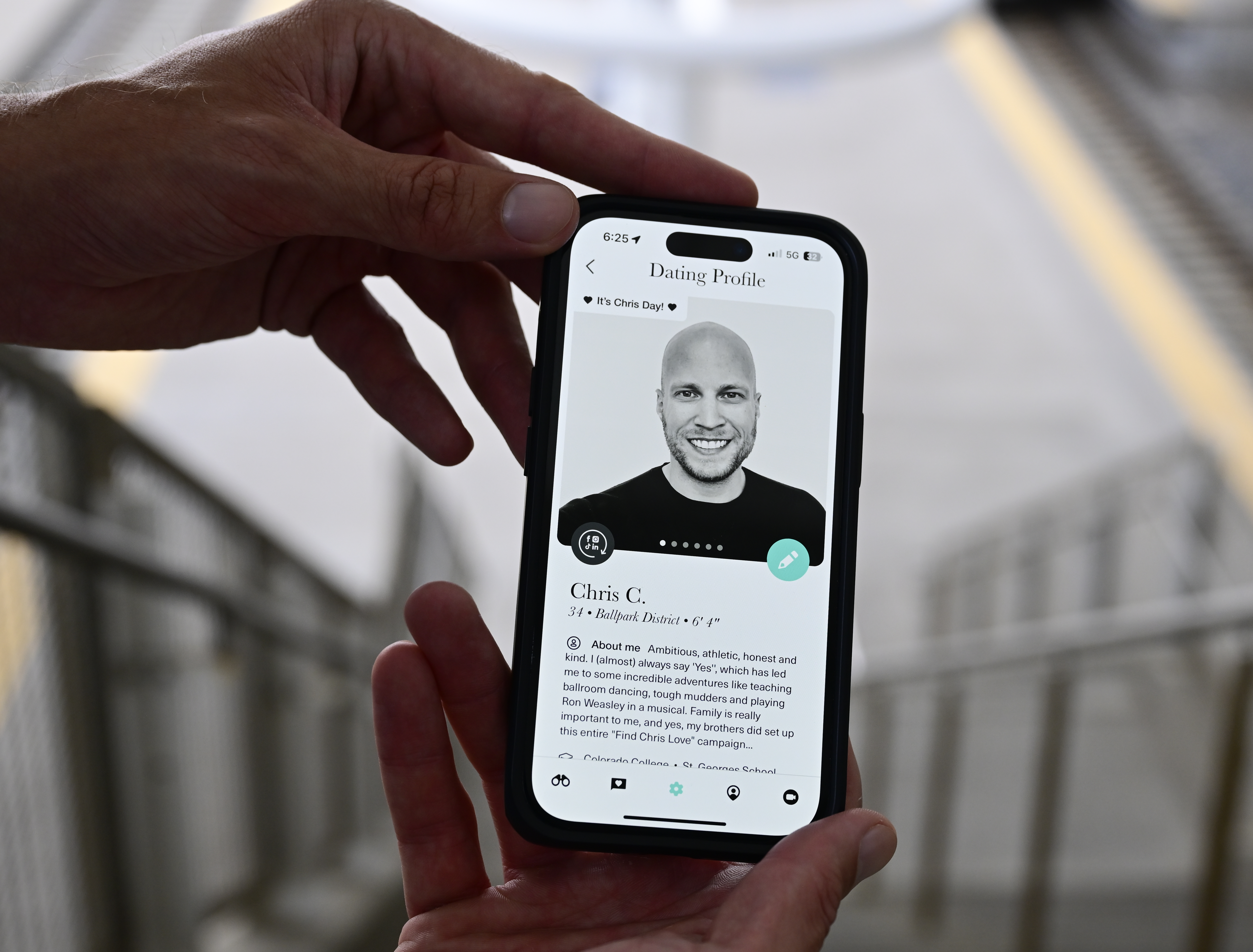 Chris Cooke holds his phone with his profile on it from the dating app The League at Union Station Wednesday, July 10, 2024. (Photo by Andy Cross/The Denver Post)