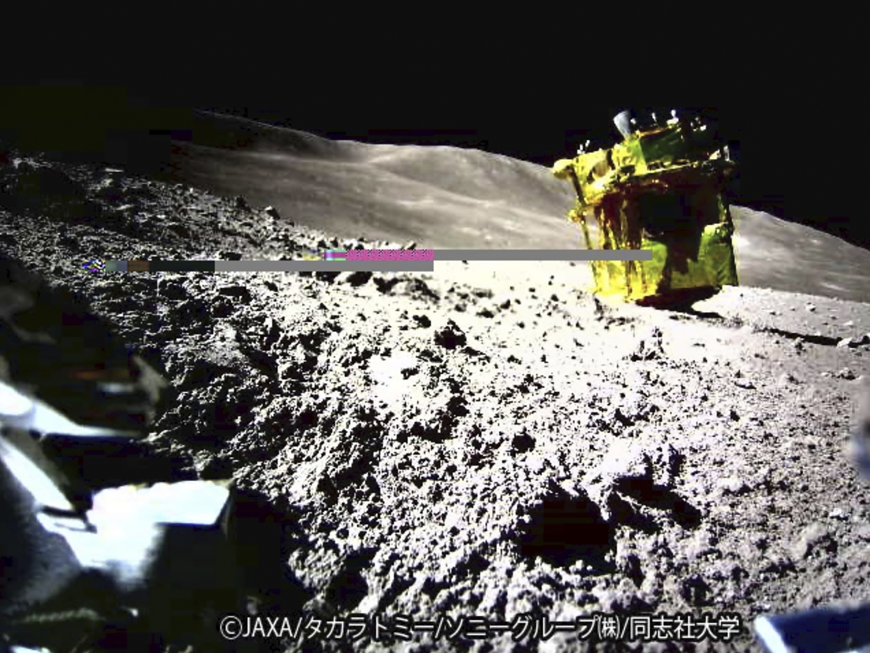 An image taken by a Lunar Excursion Vehicle 2 (LEV-2) of the robotic moon rover called Smart Lander for Investigating Moon on the moon. The lander tipped during landing, ending up on its head (JAXA/Takara Tomy/Sony Group Corporation/Doshisha University via AP, File)