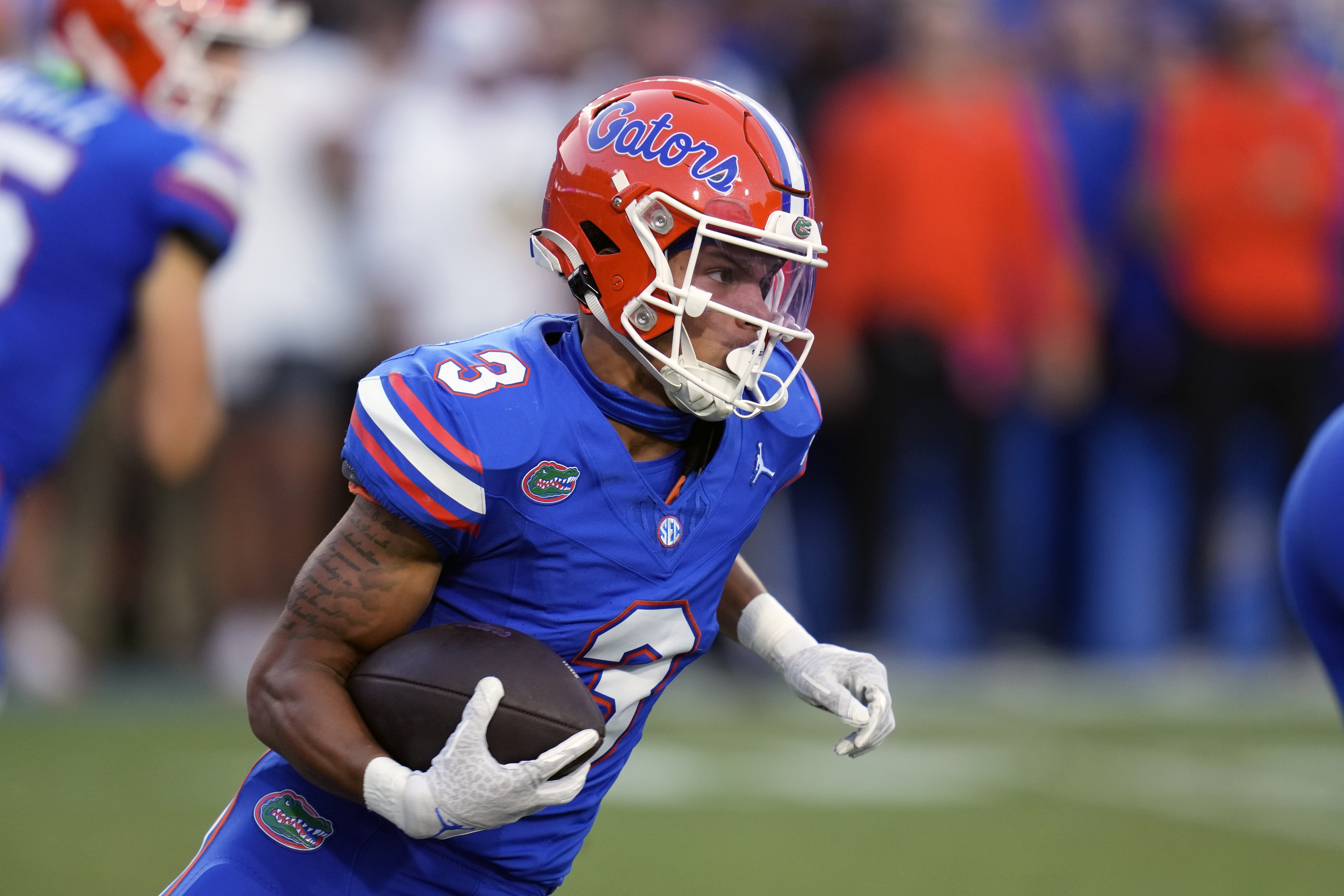 Florida wide receiver Eugene Wilson III runs against Tennessee during the Gators' 29-16 win Sept. 16, 2023 in Gainesville, on his way to becoming a member of the SEC's All-Freshman team. (AP Photo/John Raoux)