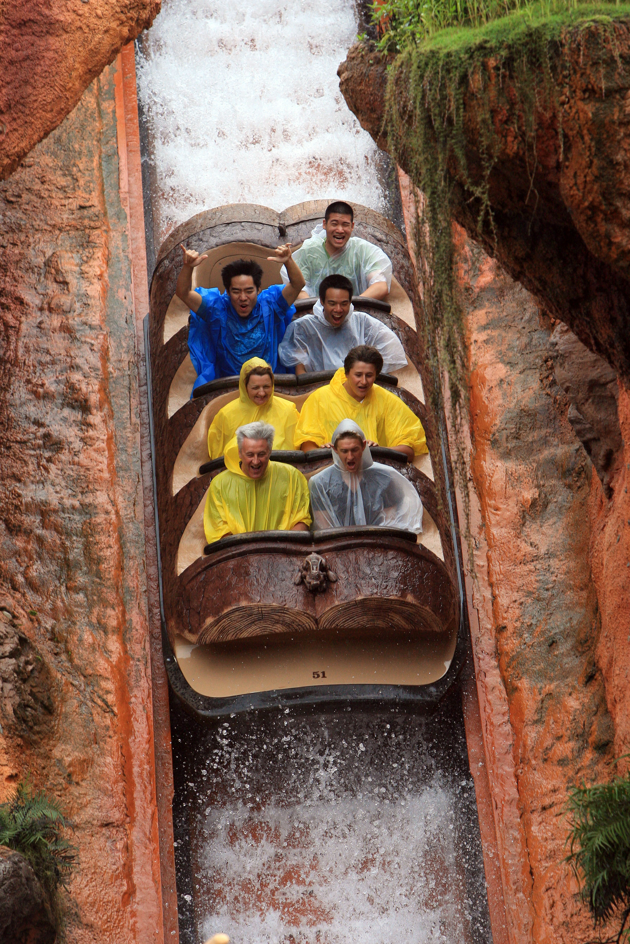 Park-goers enjoy Splash Mountain at the Magic Kingdom despite the light rains brought by Tropical Storm Fay, on Tuesday, August 19, 2008. (Ricardo Ramirez Buxeda / Orlando Sentinel) 00114943A