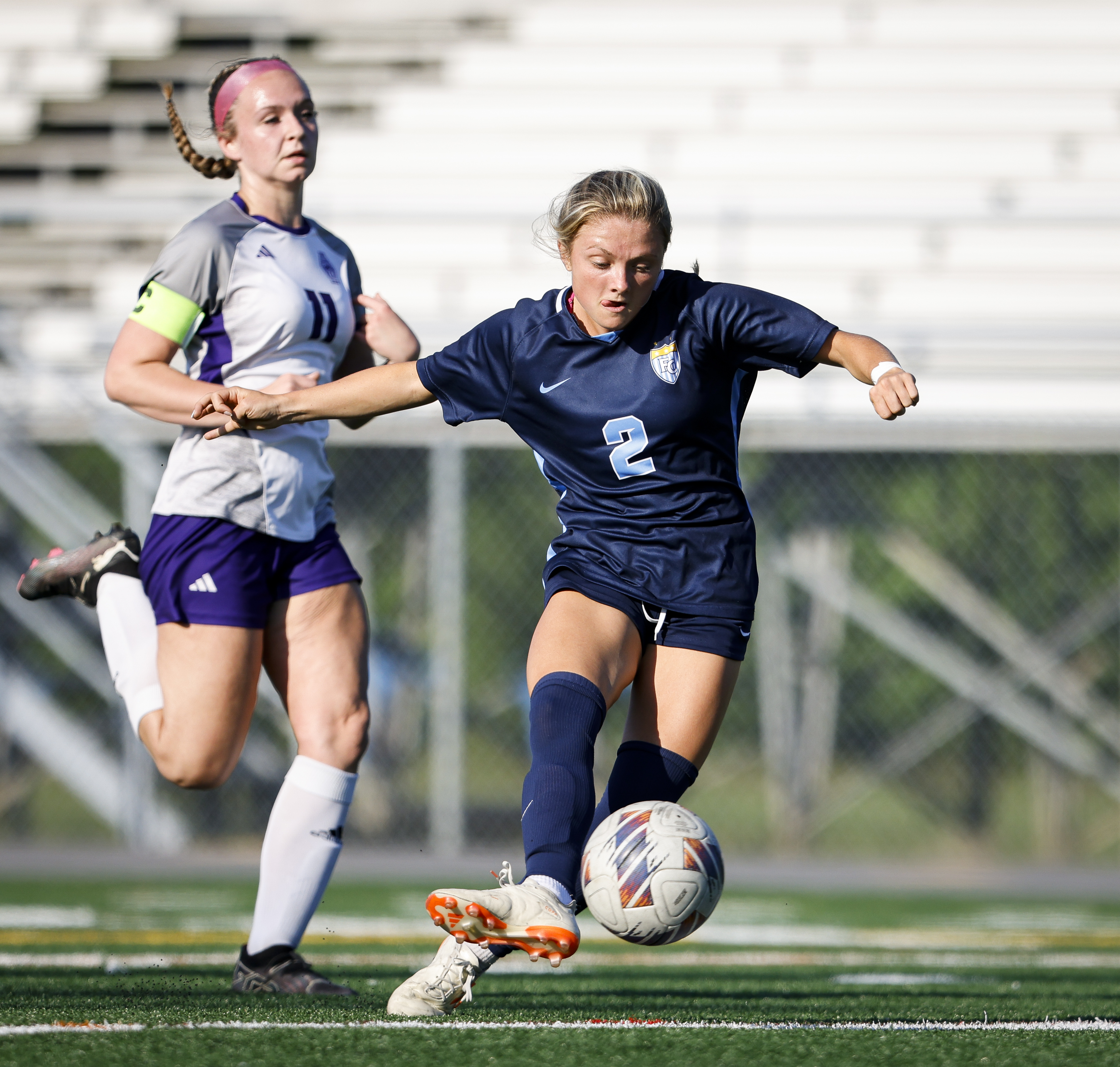 First Colonial Sydney Miller (2)takes a shot at the Deep Creek goal during a first round playoff game at First Colonial High School in Virginia Beach, Virginia, on May 22, 2024. (Billy Schuerman / The Virginian-Pilot)