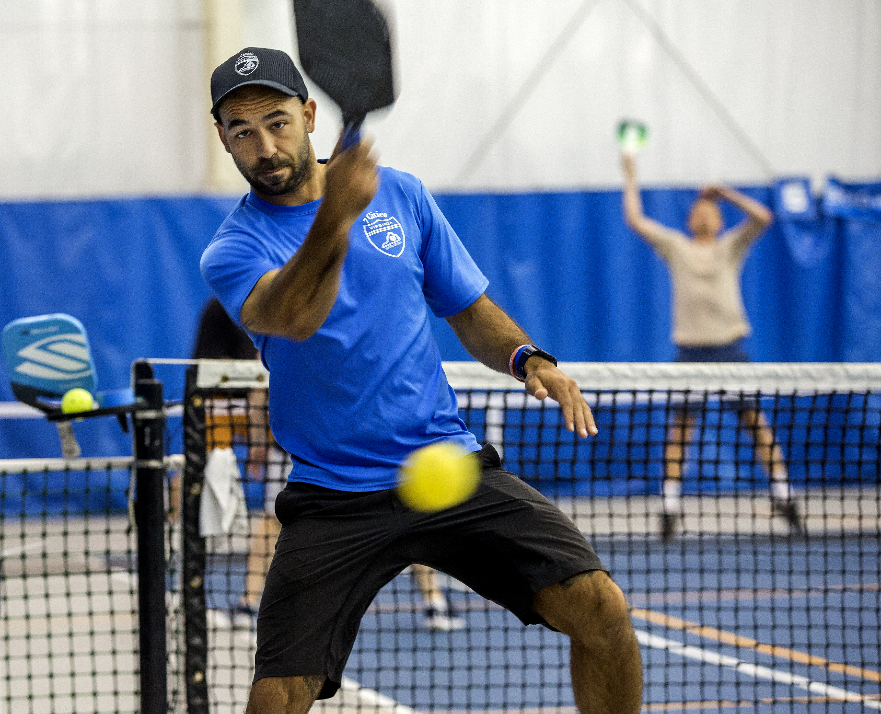 Tony Jaume, a pickleball Instructor, makes a return as he plays pickleball Tuesday morning, June 18,2024 at the Folkes-Stevens Indoor Tennis Center on the campus of Old Dominion University in Norfolk. Bill Tiernan/ For The Virginian-Pilot