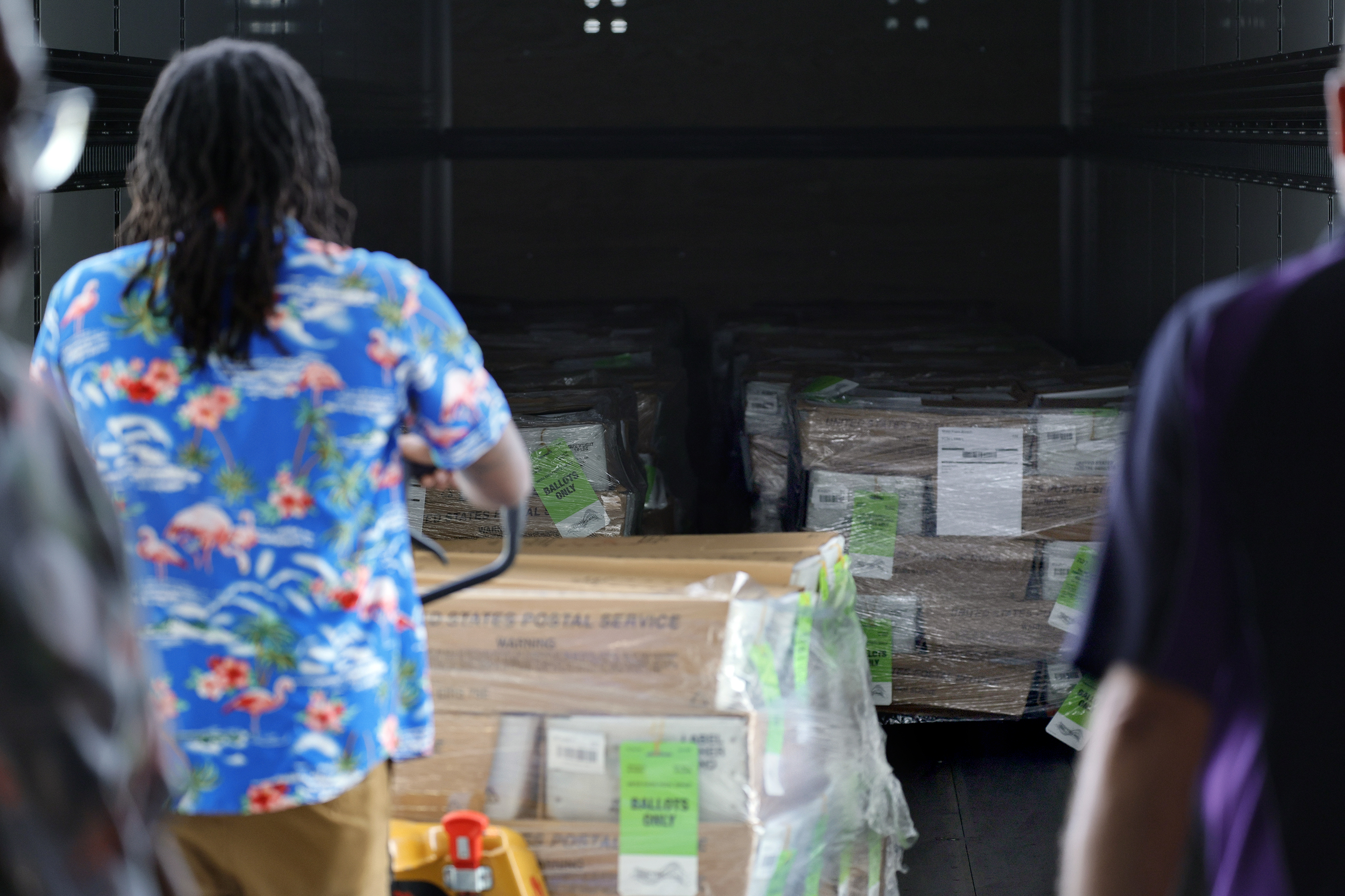 Mail ballots are loaded into a United States Postal Service truck at the Palm Beach County Supervisor of Elections Office in West Palm Beach on Friday, July 12, 2024. (Amy Beth Bennett / Sun Sentinel)