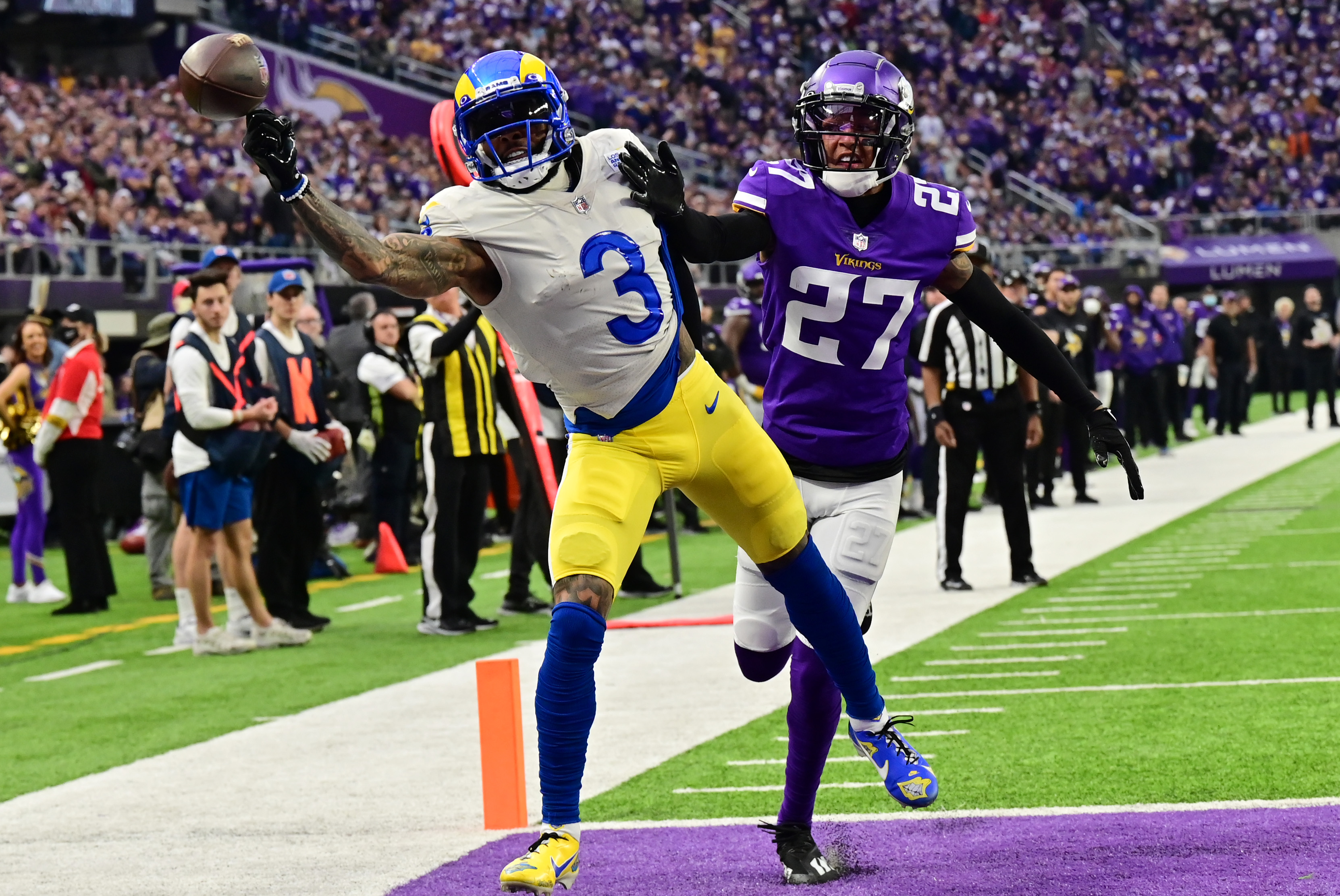 Minnesota Vikings cornerback Cameron Dantzler (27) disrupts a pass to Los Angeles Rams wide receiver Odell Beckham Jr. (3) in the second quarter of an NFL game at U.S. Bank Stadium in Minneapolis on Sunday, Dec. 26, 2021.