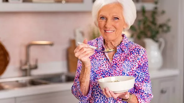 tv chef mary berry holding a bowl