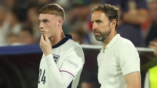 Cole Palmer of England and Gareth Southgate England coach during the UEFA EURO 2024 group stage match between England and Slovenia