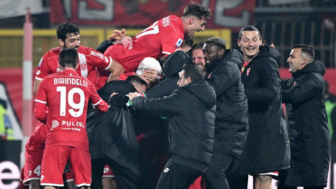 Monza celebrate scoring against AC Milan