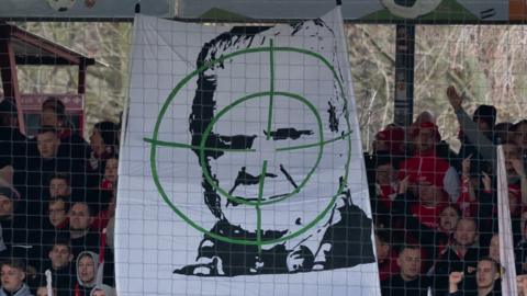 Banner of Hoffenheim president Dietmar Hopp in crosshairs