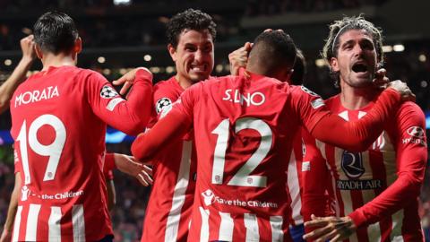 Atletico Madrid players celebrate Samuel Lino's goal against Borussia Dortmund in Champions League quarter-final