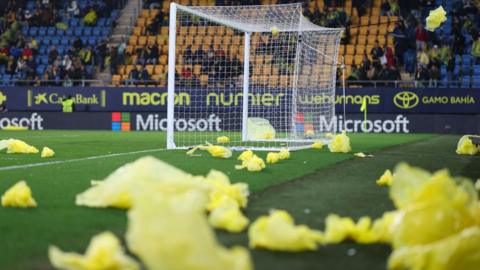 Cadiz fans threw plastic raincoats on to the pitch to protest their side's poor performances