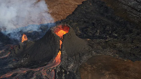 A dramatic flight over a red-hot volcano in Iceland