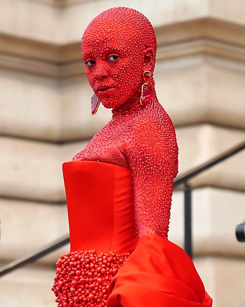 Getty Images As well as being covered with Swarovski crystals for Schiaparelli's 2023 show, Doja Cat has sported gold body paint and chicken feet boots on the red carpet (Credit: Getty Images)