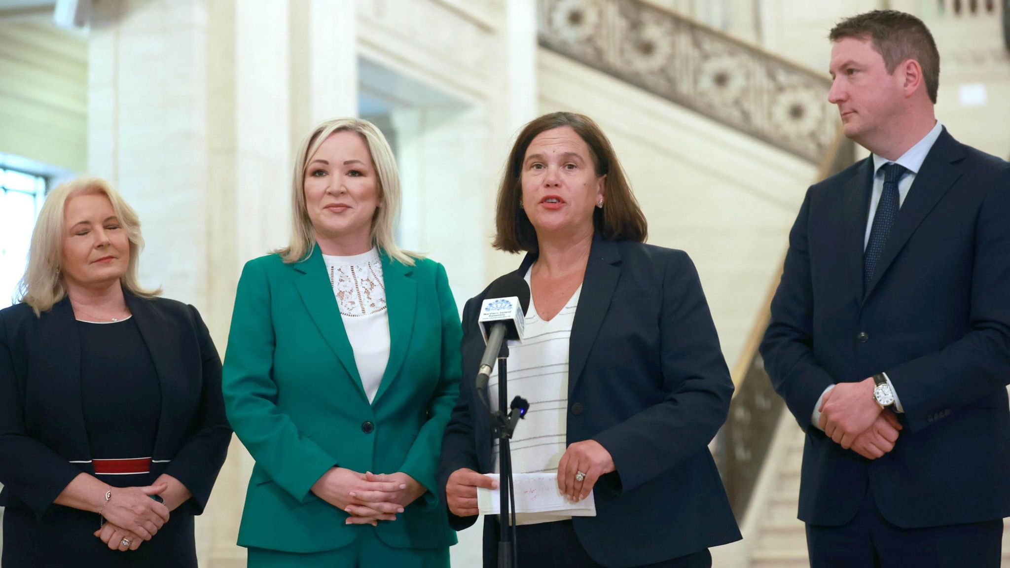 Pat Cullen, Michelle O'Neill, Mary Lou McDonald and John Finucane at the steps of the Great Hall in Stormont