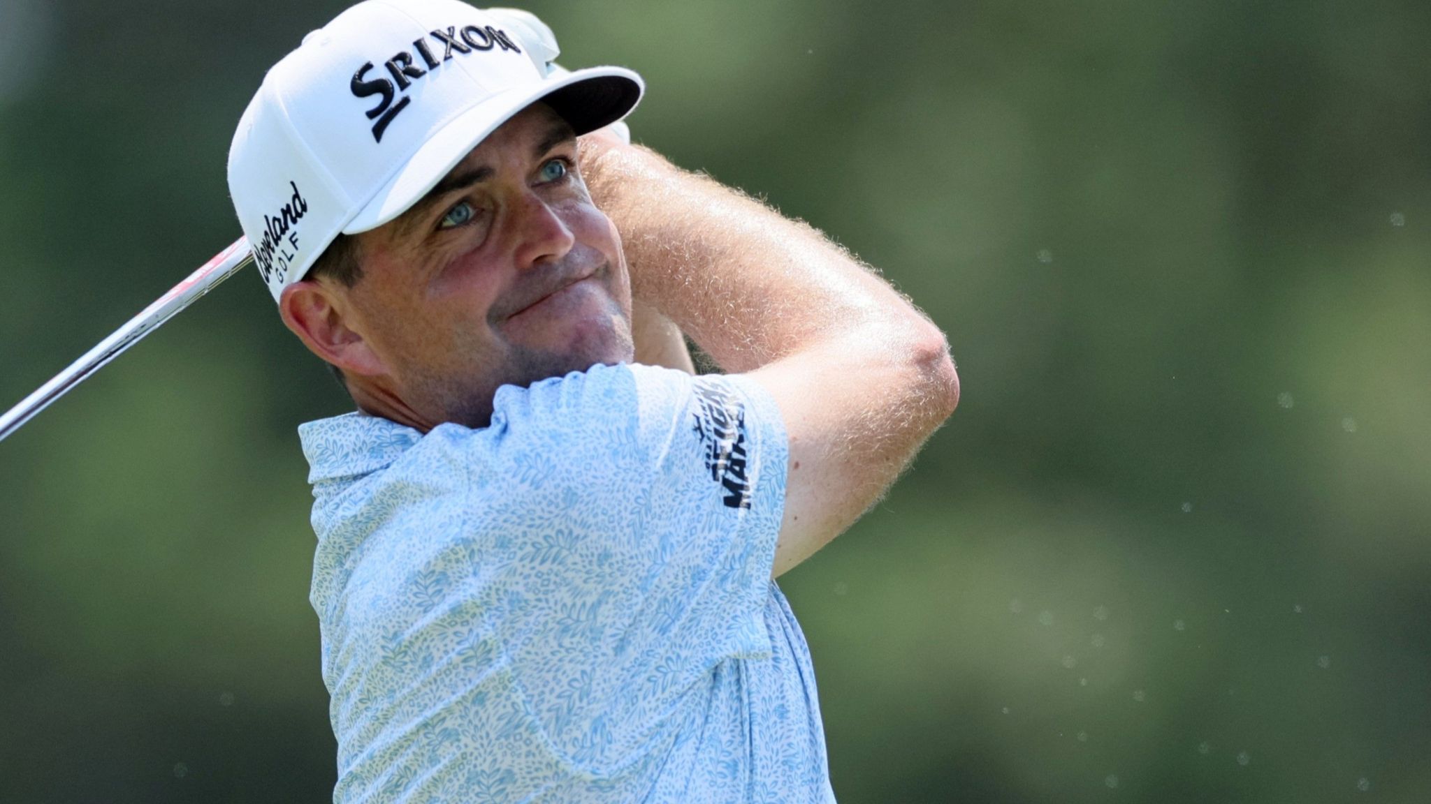 Keegan Bradley watches his ball in flight