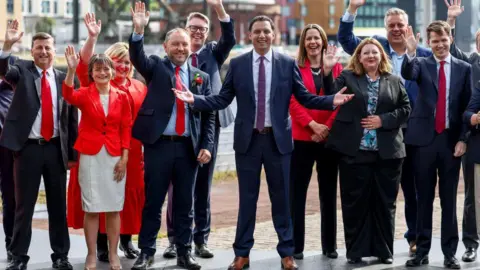 Getty Images Anas Sarwar and Ian Murray with new Labour MPS