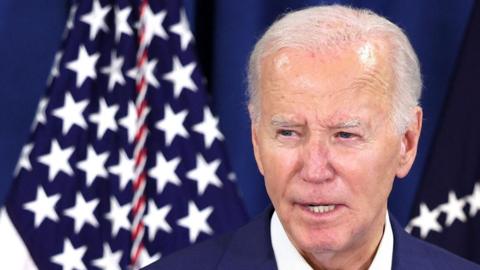 Joe Biden and a US flag