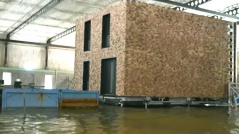 Home under flood tests