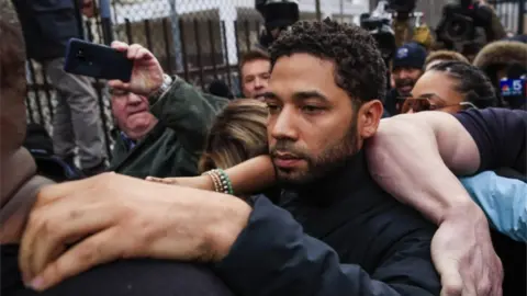 EPA Jussie Smollett emerges from the Cook County Court complex after posting 10 percent of a $100,000 bond in Chicago