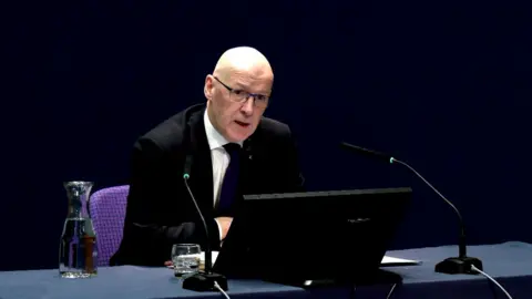 John Swinney appears at the UK Covid inquiry in Edinburgh.